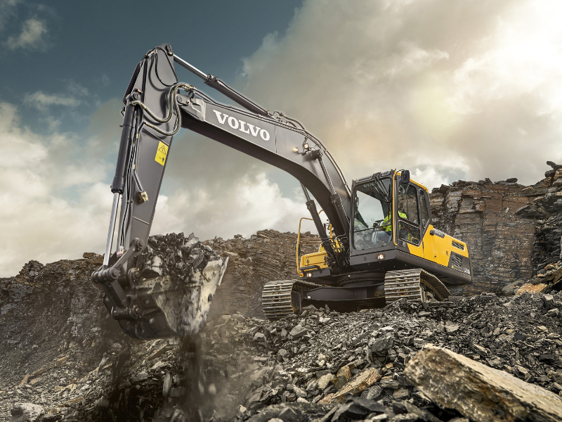 Hydraulic excavator working in a rocky mining site