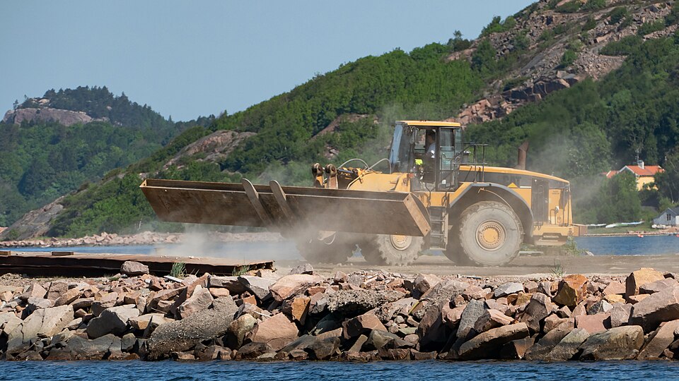 Wheel loader moving rock at a quarry